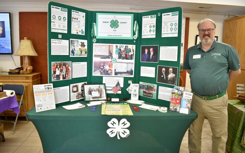 Megan Horn/The Clayton Tribune. Joey Eller, Rabun County 4-H educator, displays a booth educating about programming during the March 19 “Prelude to Spring” garden symposium hosted by Mountain Ivy Garden Club.