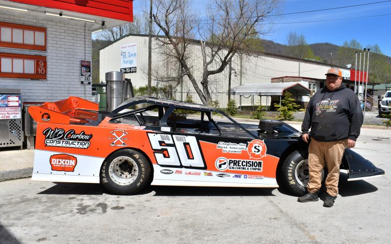 Megan Horn/The Clayton Tribune. Many local businesses sponsor Rabun County Fire Services Firefighter Jerry Buice while he races the season at Lavonia Speedway, Toccoa Raceway and in Murphy, N.C. The newest sponsor is Circle S. Pictured is Buice with his “Big Unit 50” race car in front of the Clayton business last weekend.