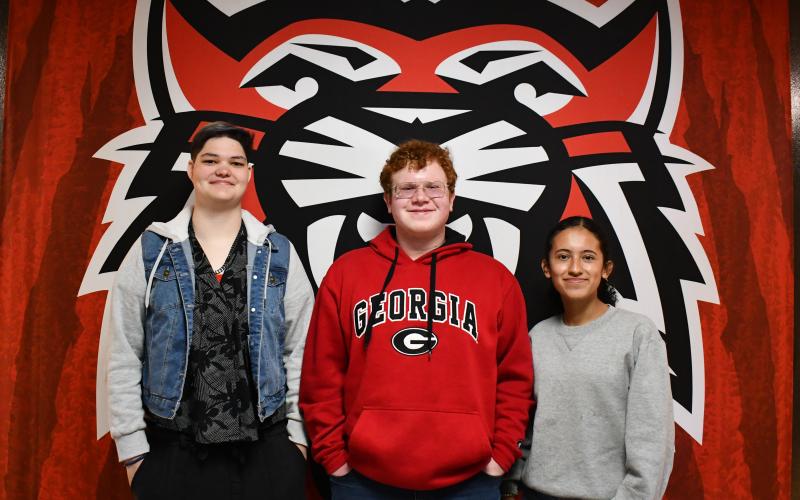 Megan Horn/The Clayton Tribune. RCHS Class of 2024 Valedictorian is Jalyn Fisher, left, Salutatorian is Isaac Craig and Historian is Itzia Vasquez. The top three said they are excited to graduate and  reflected on their time at Rabun County Schools, noting they feel the system prepared them to move on to their postsecondary education goals.