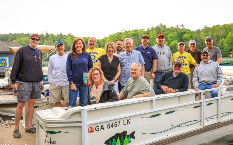 Photo credit to Melissa Elzey. The Clayton Rotary Volunteers smile for the camera as they help with LBCA Clean Up Day.
