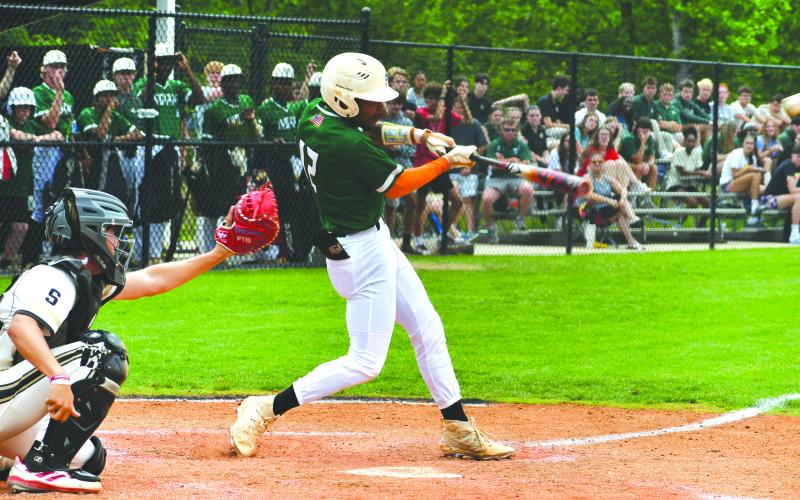 Wade Cheek/The Clayton Tribune. TFS baseball junior outfielder BJ Carver knocks in the winning run with an RBI single in the top of the seventh inning in the Indians’ quarterfinal series against Swainsboro in the Georgia Class A DI state tourney.