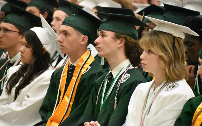 Matthew Osborne/CNI News Service. TFS graduates listen intently during the ceremony.