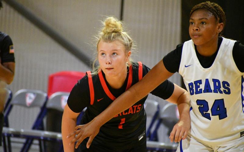 Wade Cheek/The Clayton Tribune. Lady Cat sophomore forward Kenlee Hedge prepares to collect a rebound after a free-throw attempt from one of her RCHS teammates against Burke County on Friday, June 14.