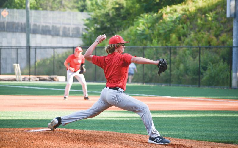 Wade Cheek/The Clayton Tribune.  Wildcat pitcher Lleyton Phillips starts off Rabun County’s game against East Jackson on Thursday, June 13, when the Wildcats beat the Eagles 7-2.
