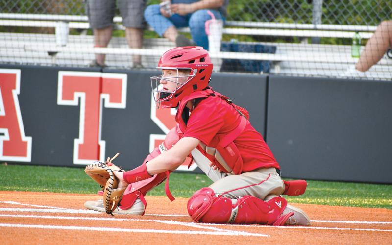 Wade Cheek/The Clayton Tribune. Wildcat baseball freshman Colter Cannon prepares to receive a pitch during the Wildcats’ game against East Jackson on Thursday, June 13. Cannon will be one of many new members added to this upcoming season’s roster.