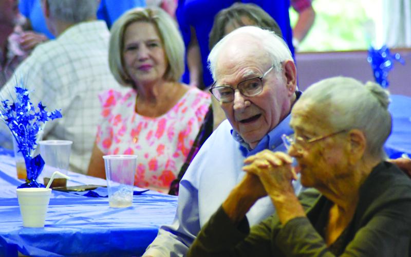 Enoch Autry/The Clayton Tribune. Chastain sits with his 99-year-old sister-in-law Rose Chastain.