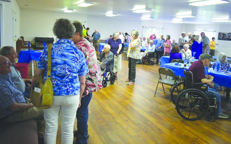 Enoch Autry/The Clayton Tribune. For three hours on June 15, a steady stream of well-wishers congratulated Ervin Chastain on turning 101.