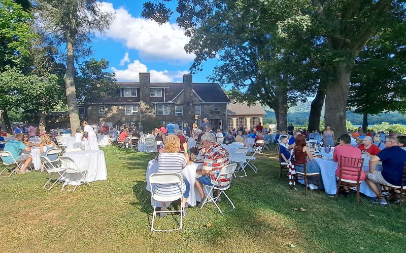 Megan Horn/The Clayton Tribune. Hundreds of people enjoyed the festivities at The Dillard House, which is the last Fourth of July hosted by the Dillard family. Below: Natalie Dillard took this picture of the biggest fireworks show yet at The Dillard House July 6.