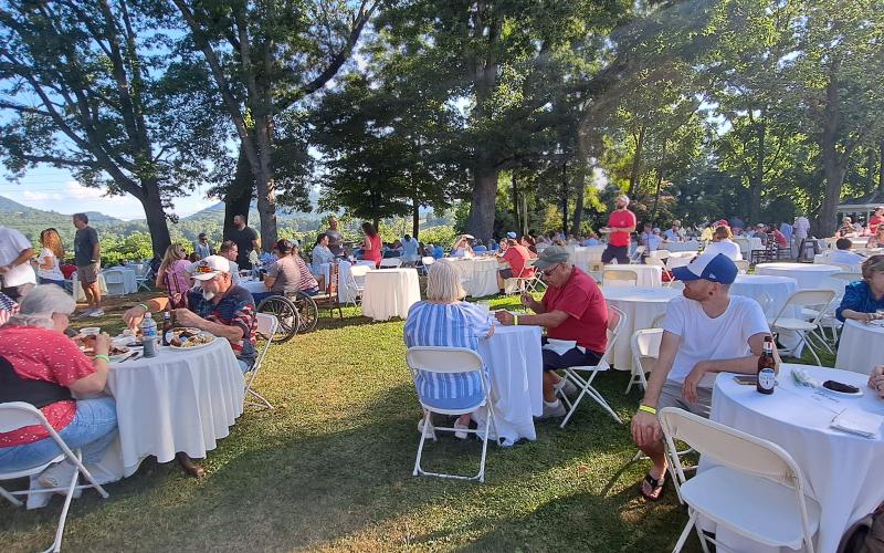 Megan Horn/The Clayton Tribune. Hundreds of people enjoyed the festivities at The Dillard House, which is the last Fourth of July hosted by the Dillard family. Below: Natalie Dillard took this picture of the biggest fireworks show yet at The Dillard House July 6.