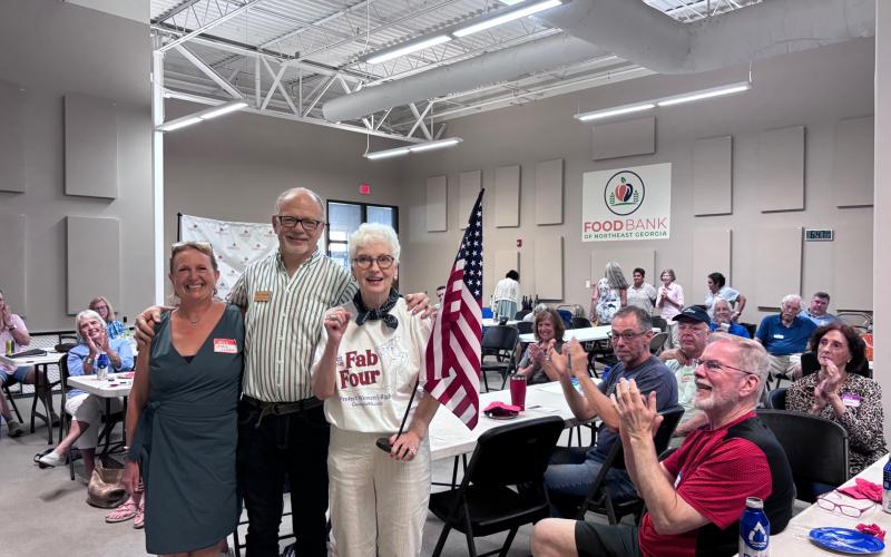 Submitted photo. Maria Loveless (left); Don Martin, Rabun Democrats chair; and Paulette Williams at the July 8 Rabun County Democrats monthly meeting at the Food Bank of Northeast Georgia. Loveless and Williams updated attendees on their individual campaign activities.