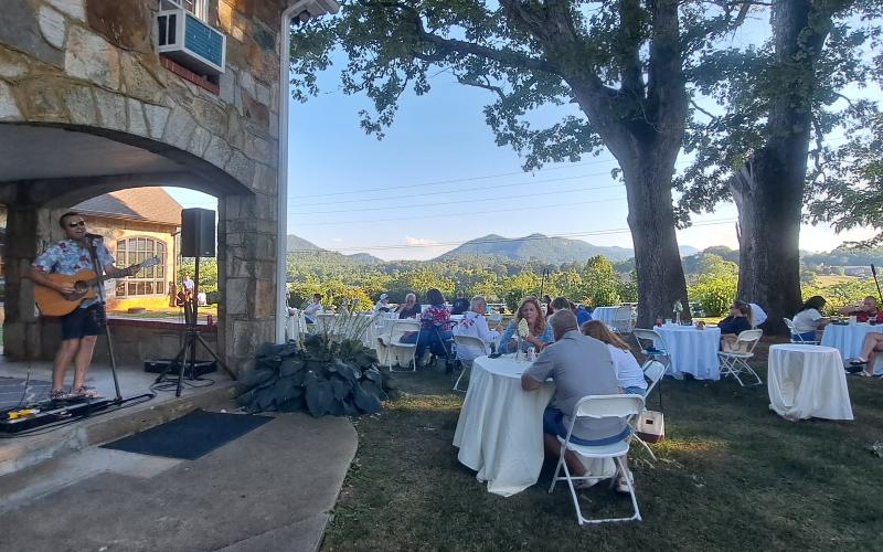 Megan Horn/The Clayton Tribune. Hunter Grayson performs live music during The Dillard House Independence Day event July 4.Below: Natalie Dillard took this picture of the biggest fireworks show yet at The Dillard House July 6.