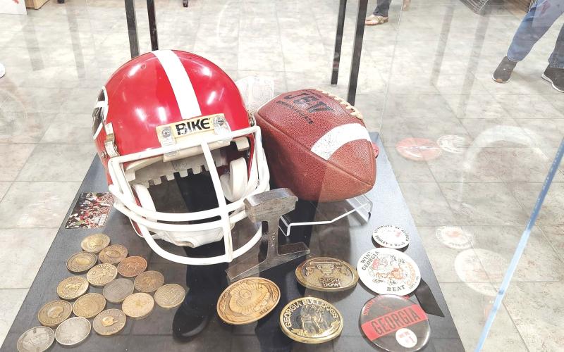 Wade Cheek/The Clayton Tribune. University of Georgia Athletic artifacts on display at the Rabun County Library during the UGAAA’s exhibit tour stop.