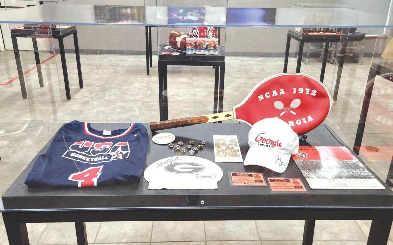 Wade Cheek/The Clayton Tribune. Including the Team USA jersey of former UGA basketball legend Teresa Edwards and ten gymnastics national title rings, and a number of artifacts sit on display.