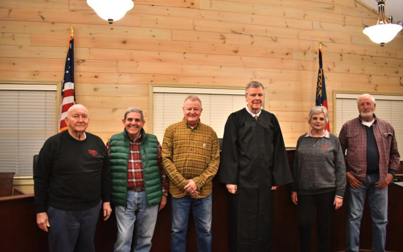 File photo/Megan Horn/The Clayton Tribune. Jackie Watts, left, was sworn in for another term as a council member in Tiger earlier this year in January. He was a sitting council member since 2020 when he passed. Pictured with Watts are Council Member Pete Marziliano; Mayor Mike Carnes; Probate Judge Carlton Hobie Jones, III; Council Member and Mayor Pro Tem Karen Lovell; and Council Member James Gragg. Watts also served the City of Tiger as Mayor from 1984-1988.