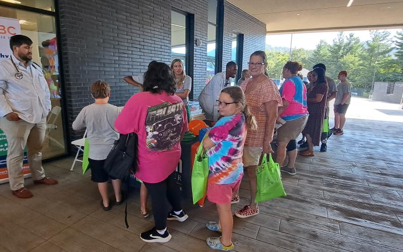 Megan Horn/The Clayton Tribune. Community members attend the Mountain Lakes Medical Center Back-To-School Health Fair on Saturday, Aug. 3. The event was supported by Mountain Lakes Physician Group Rural Health Clinic, Mercer University School of Medicine and Children’s Healthcare of Atlanta, among many other community partners.