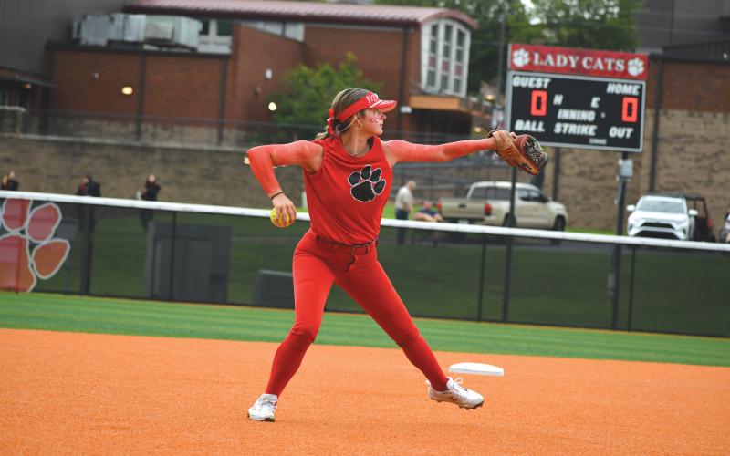 Wade Cheek/The Clayton Tribune. Senior infielder Jacie McCall gets ready to fire a throw over to first base to record an out in the Lady Cats’ scrimmage earlier this season.