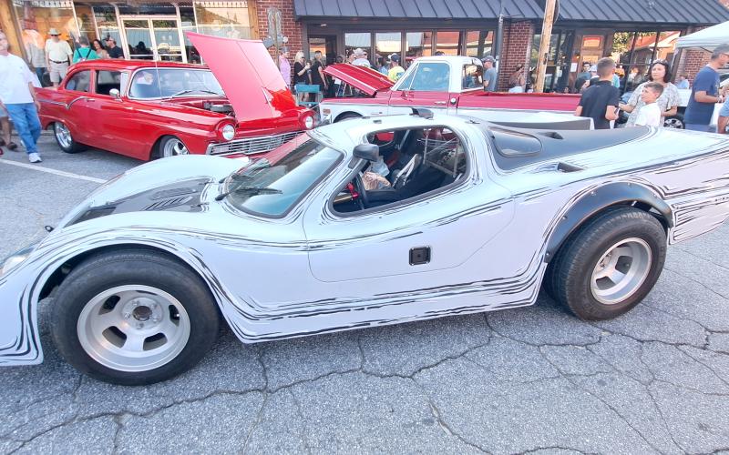 Megan Horn/The Clayton Tribune. One of the unique vehicles featured at the Cruise-In portion of the Downtown Clayton Block Party last weekend drew a lot of attention by onlookers on Aug. 10.