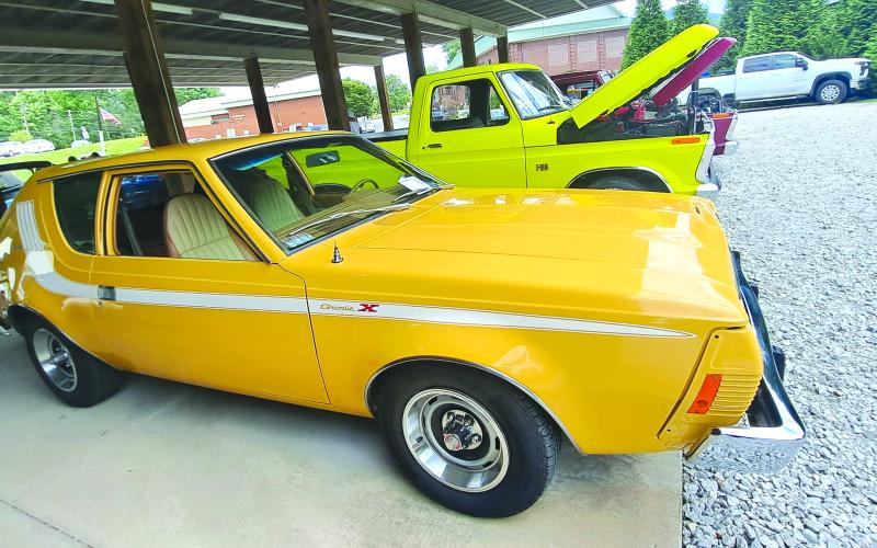 Megan Horn/The Clayton Tribune. This yellow 1974 AMC Gremlin with a 258 6 cylinder engine has its original interior and is owned by Brucz Richter. It was featured at last weekend’s Rockin’ Mountain Motor Show.