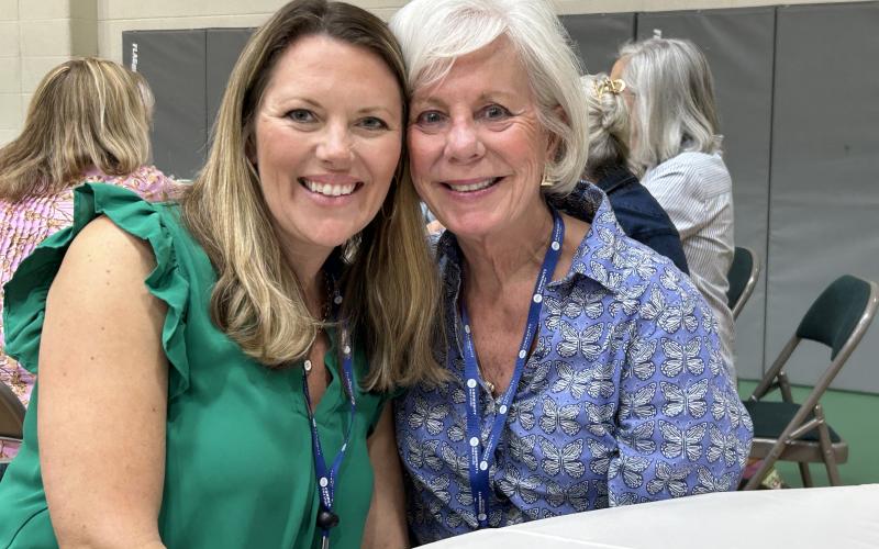 Submitted photo. Michelle Waldrip and her CBS Core Leader, Mary Boland, share a joyful moment at the 2024 Community Bible Study May luncheon.
