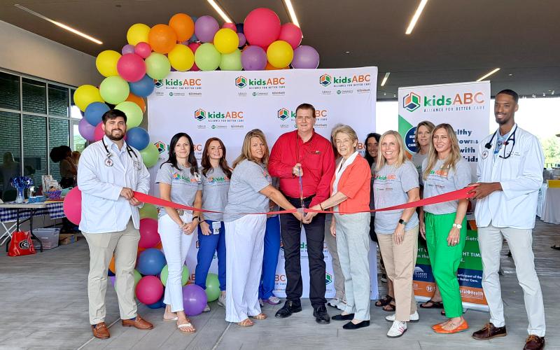 Megan Horn/The Clayton Tribune. Mountain Lakes Medical Center holds a Forward Rabun/Rabun County Chamber of Commerce ribbon cutting for KidsABC, an alliance between Children’s Healthcare of Atlanta and Mercer University, to expand healthcare access and education for children in our rural communities. The partnership is part of Mountain Lakes Medical Center’s ongoing rural healthcare community engagement program.