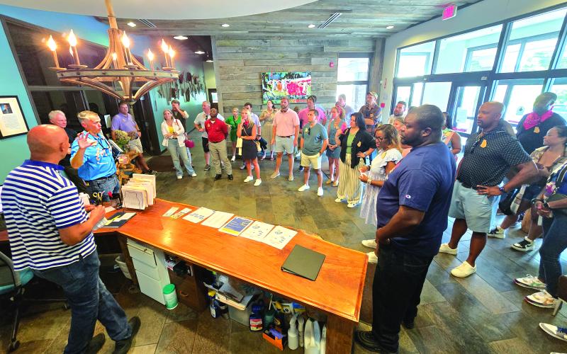 Enoch Autry/The Clayton Tribune.  James Brim gives members of the Leadership Georgia group information about the Food Bank of Northeast Georgia. Below: Submitted photo: The Tallulah Gorge State Park one of the many stops for the Leadership Georgia class who visited Rabun County last week.