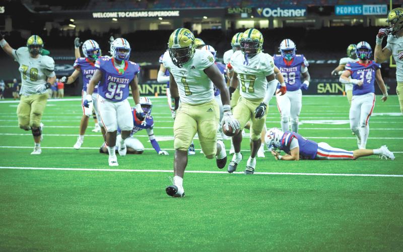 Wade Cheek/The Clayton Tribune. Newly added Rabun Gap-Nacoochee running back and University of Georgia commit Bo Walker runs in for a touchdown in Rabun Gap’s 27-12 win over John Curtis Christian on Friday, Sept. 6, in the Caesars Superdome in New Orleans. The Eagles’ next game is Sept. 20 at home.