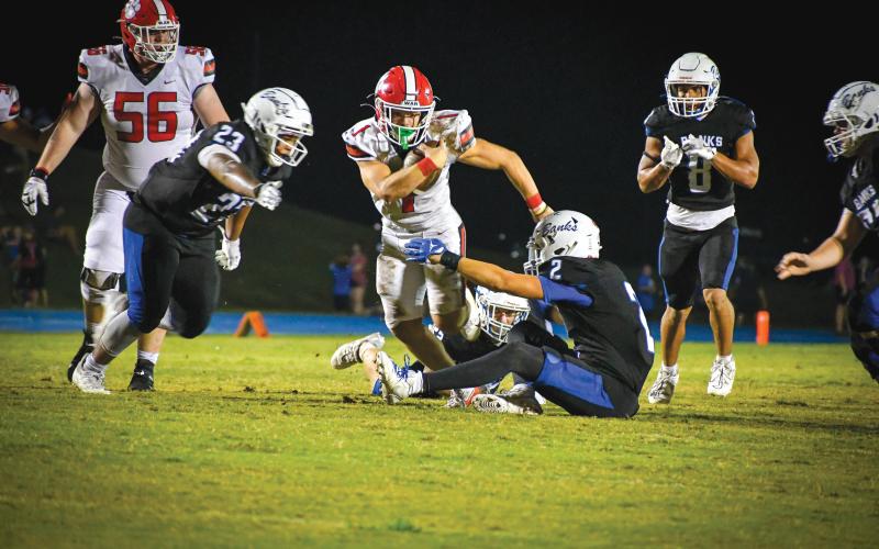Wade Cheek/The Clayton Tribune. Rabun football junior running back Lake Evans rushed for 92 yards on just 10 carries while scoring a touchdown during the Wildcats’ 31-9 win over Banks County last Friday, Sept. 20.