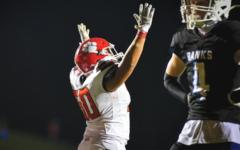 Wade Cheek/The Clayton Tribune. Senior Brian Bohorquez celebrates a touchdown early in the Wildcats’ road contest against Banks County on Friday, Sept. 20. RCHS is 4-1 and ranks as the No. 8 team in Georgia Class A Division I.