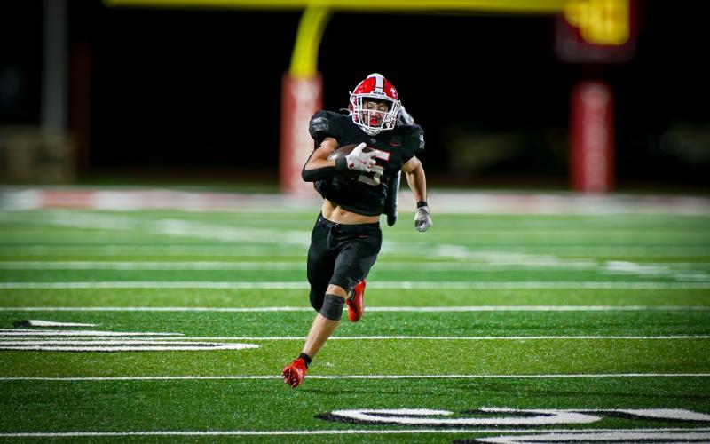 Wade Cheek/The Clayton Tribune. Junior running back Reid Giles sprints to the end zone for a Wildcat touchdown during Rabun County’s win over Dalton. Giles and the Wildcats are now 2-1 on the season.
