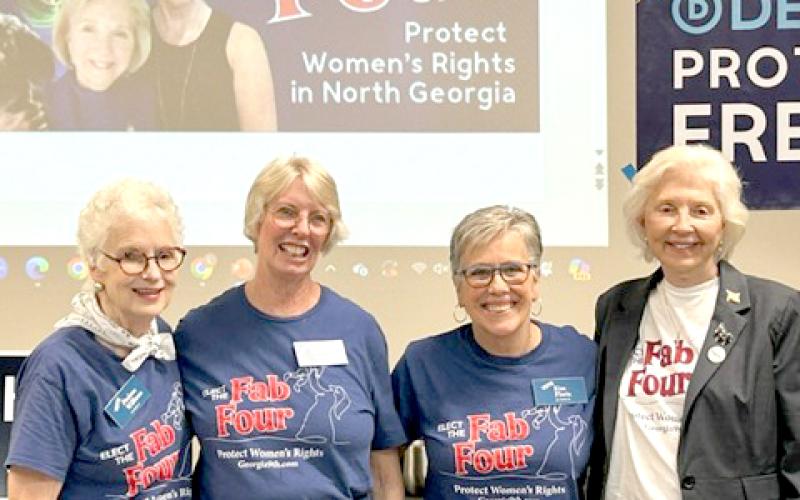 Submitted photo.  Rabun County resident Paulette Williams (left); Charlotte Sleczkowski of Towns County; Kim Floria of Hall County; and June Krise of White County were welcomed by a packed crowd Monday, Sept. 9, in the community room of the Food Bank of Northeast Georgia.