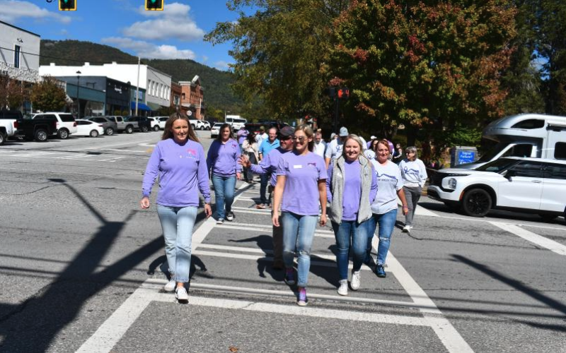 File/Megan Horn/The Clayton Tribune. Fight Abuse in the Home (F.A.I.T.H.) has many events planned for October during Domestic Violence Awareness Month. Pictured are community members participating in last year’s Hope Walk where they wore purple and walked through downtown Clayton while local businesses stood in solidarity holding candles on the sidewalk to bring awareness. This year’s Hope Walk is scheduled for Wednesday, Oct. 2, around 11:30 p.m. at The Rock House, 39 E Savannah Street, Clayton.