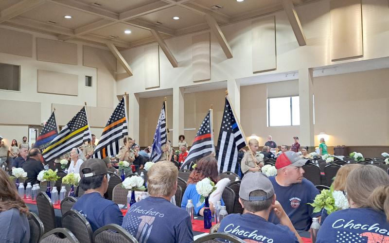 Megan Horn/The Clayton Tribune. Boy Scouts of America Troops 6 and 19 present the flags representing each branch of public safety including law enforcement; EMS; fire; dispatch; corrections; and search and rescue during the second annual Rabun County First Responder Appreciation Dinner on Aug. 30.