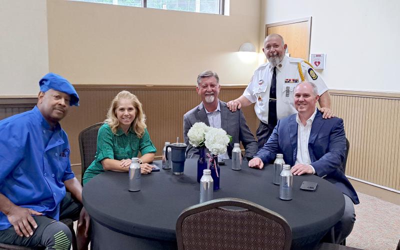 Megan Horn/The Clayton Tribune. Mike McKissack, owner the Sunday Diner restaurant (left); Suzie Nixon Flaherty; Clayton Mayor Kurt Cannon; David Cross; and Forward Rabun/Rabun County Chamber of Commerce President Rick Story attend the second annual First Responder Appreciation Dinner on Aug. 30. Local restaurant Sunday Diner catered the event.