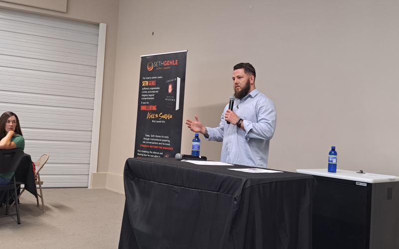 Megan Horn/The Clayton Tribune. Seth Gehle, author, veteran and survivor, was the keynote speaker at the Aug. 29 Mountain Judicial Circuit Family Violence Task Force Stopping Violence Breakfast. Gehle shared his heartbreaking story about how he remains resilient.