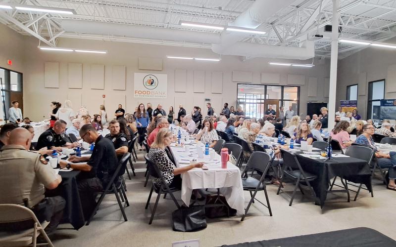 Megan Horn/The Clayton Tribune. Numerous leaders in the community including officials, law enforcement, church leaders, nonprofit representatives and many others in Rabun County and the region came together to learn more about how to prevent violence at the Stopping Violence Breakfast on Aug. 29. The Community Room at the Food Bank of Northeast Georgia was filled with attendees.