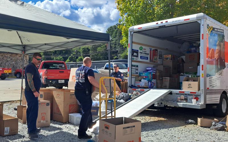 Megan Horn/The Clayton Tribune. Emergency personnel from Station 1 in Clayton collect items for hurricane victims Wednesday. The drop-off will be at 36 Emergency Drive, Clayton until around noon Friday. Oct. 4.