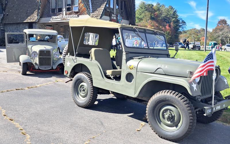 Megan Horn/The Clayton Tribune. Grace and Rick of Sky Valley, Ga., own these unique vehicles featured in the Classic Car Show at the Sky Valley Fall Fest last weekend. Pictured are a Willeys M38A 1952 and a Ford Pickup Model BB 1934. Below: Veterans of Foreign Wars (VFW) Post 4570 cooked hotdogs for the community at the Sky Valley Fall Fest.