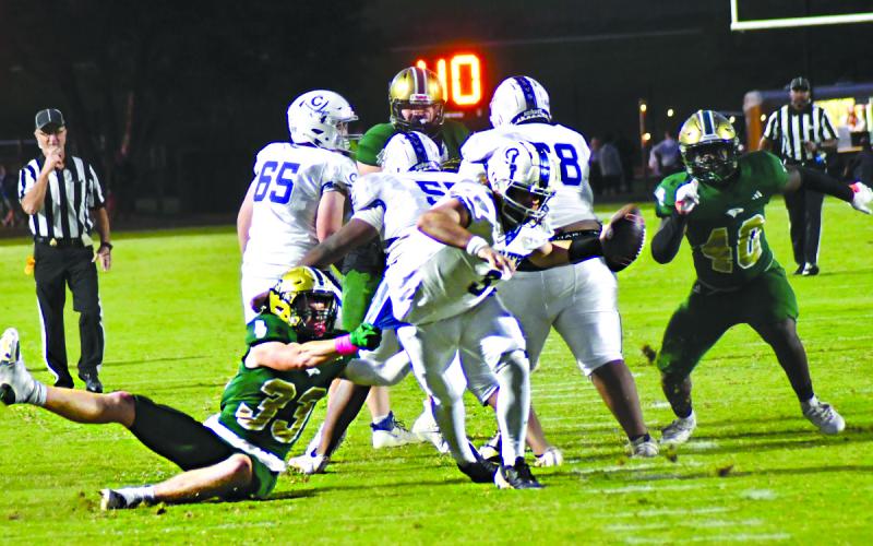 Enoch Autry/The Clayton Tribune. RGNS junior defensive end Liam Keith sacks Anderson quarterback Braxton Johnson during the Eagles 56-0 Homecoming victory.