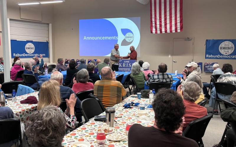Submitted. Rabun County Commissioner Kent Woerner is welcomed to the Rabun County Democrats Oct. 14 meeting and speaks about the upcoming Special Purpose Local Option Sales Tax (SPLOST). A crowd of over 70 people attended the meeting.