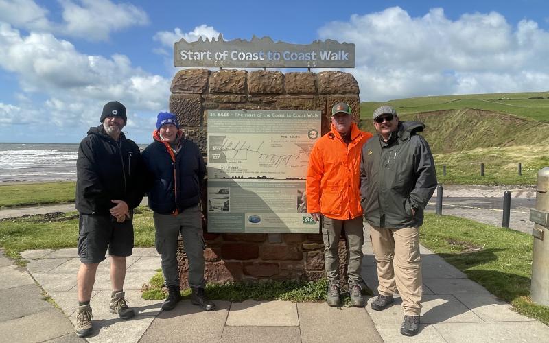 Local firefighter Chuck Bray, pictured far right, hiked 192 miles to raise awareness for the mental health of first responders during the Coast to Coast Walk in Northern England. Pictured with Bray at the start of the Coast to Coast Walk are Pete Lewin, a paramedic from England, Pete Keenan, who is retired military from England, as well as Skip Ockomon, a retired firefighter from Indianapolis who is with the Burnt Out Network Podcast along with Bray.