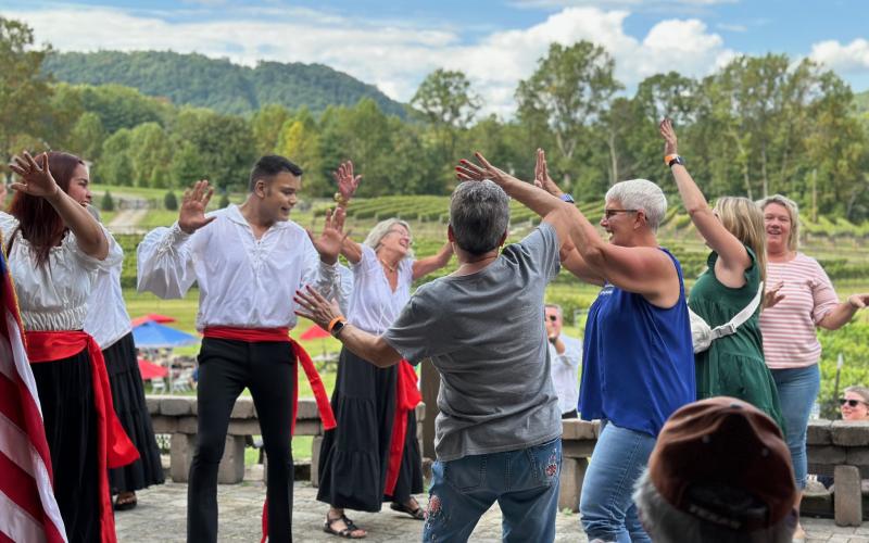 Submitted photo. The Rabun Entertainers as well as guests at the event dance to Italian-themed Harvest songs.