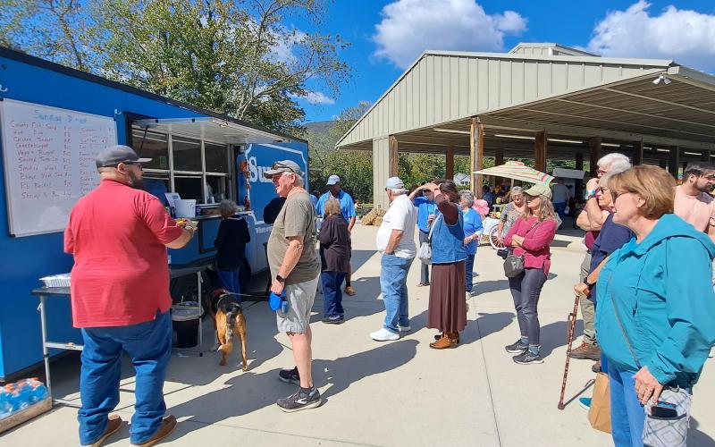 Megan Horn/The Clayton Tribune. Local restaurant Sunday Diner was one of the restaurants catering during last weekend’s Foxfire Mountaineer Festival and people lined up to enjoy the delicious food. Below: Submitted photo from the Foxfire Mountaineer Festival.