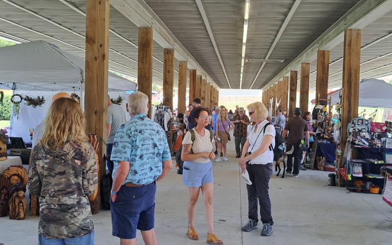 Megan Horn/The Clayton Tribune. Crowds of people showed out to Clayton for the annual Foxfire Mountaineer Festival on Saturday, Oct. 5. Below: Submitted photo from the Foxfire Mountaineer Festival.