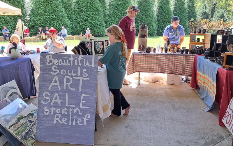 Megan Horn/The Clayton Tribune. Since the Foxfire Mountaineer Festival was held the weekend after Hurricane Helene, many crafters set up ways attendees could help storm victims during their time of need. Below: Submitted photo from the Foxfire Mountaineer Festival.