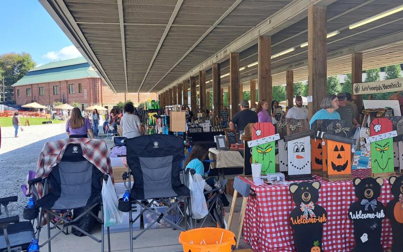 Megan Horn/The Clayton Tribune. Crowds of people showed out to Clayton for the annual Foxfire Mountaineer Festival on Saturday, Oct. 5. Below: Submitted photo from the Foxfire Mountaineer Festival.
