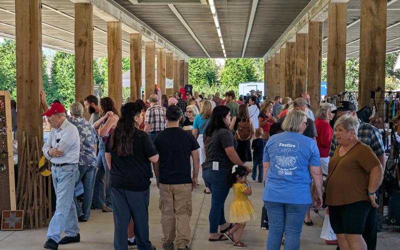 Megan Horn/The Clayton Tribune. Crowds of people showed out to Clayton for the annual Foxfire Mountaineer Festival on Saturday, Oct. 5. Below: Submitted photo from the Foxfire Mountaineer Festival.