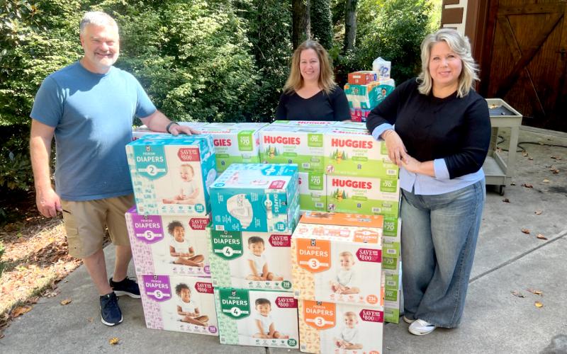 Submitted photo. Pictured are District 10 State Rep. Victor Anderson, Shannon Jensen and Kim Anderson who donated supplies for hurricane victims.