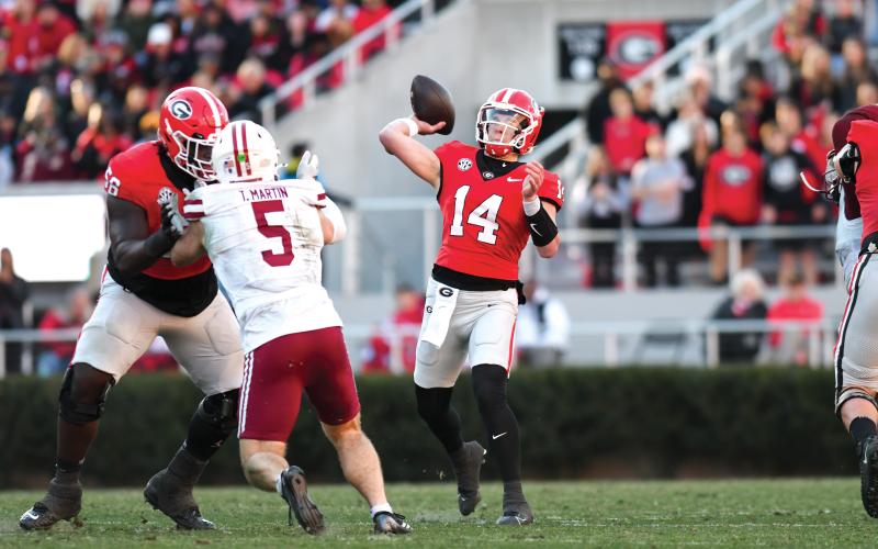 Wade Cheek/The Clayton Tribune. Former Rabun County football standout and current Georgia backup quarterback Gunner Stockton saw reps during the Bulldogs’ 59-21 win over UMass. Stockton led an eight-play, 65-yard drive that ended with a touchdown.