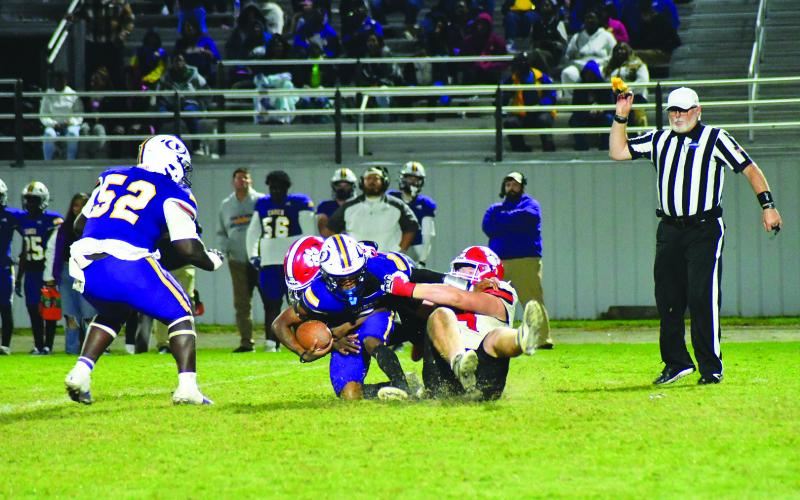 Enoch Autry/The Clayton Tribune. A disputed facemask penalty against Rabun County gave the Purple Hurricane a first down in the first round of the state football playoffs in Fitzgerald. With the penalty yardage, Fitzgerald would score a touchdown on the drive. The Purple Hurricane then would also get a fumble recovery and put another TD on the scoreboard. That series of events pushed the Purple Hurricane to the 42-21 win over Rabun.