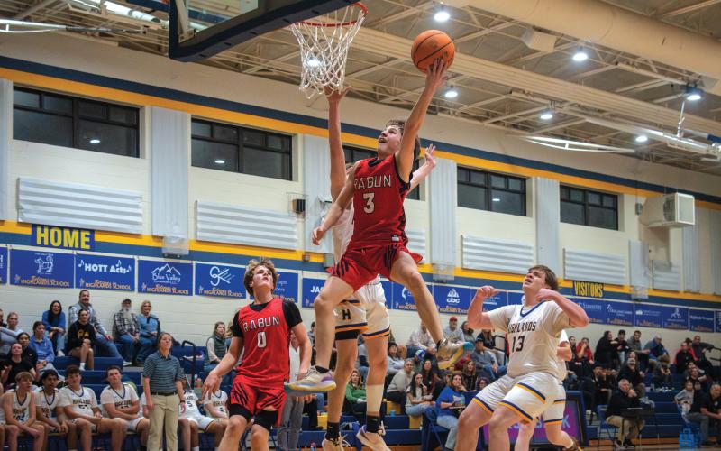 Wade Cheek/The Clayton Tribune. RCHS sophomore guard Huey Blalock scored 22 points in the Wildcats season-opening win over Highlands School on Nov. 14. The Rabun boys are currently 2-0 and ranked eighth in Class 1A-Division I.